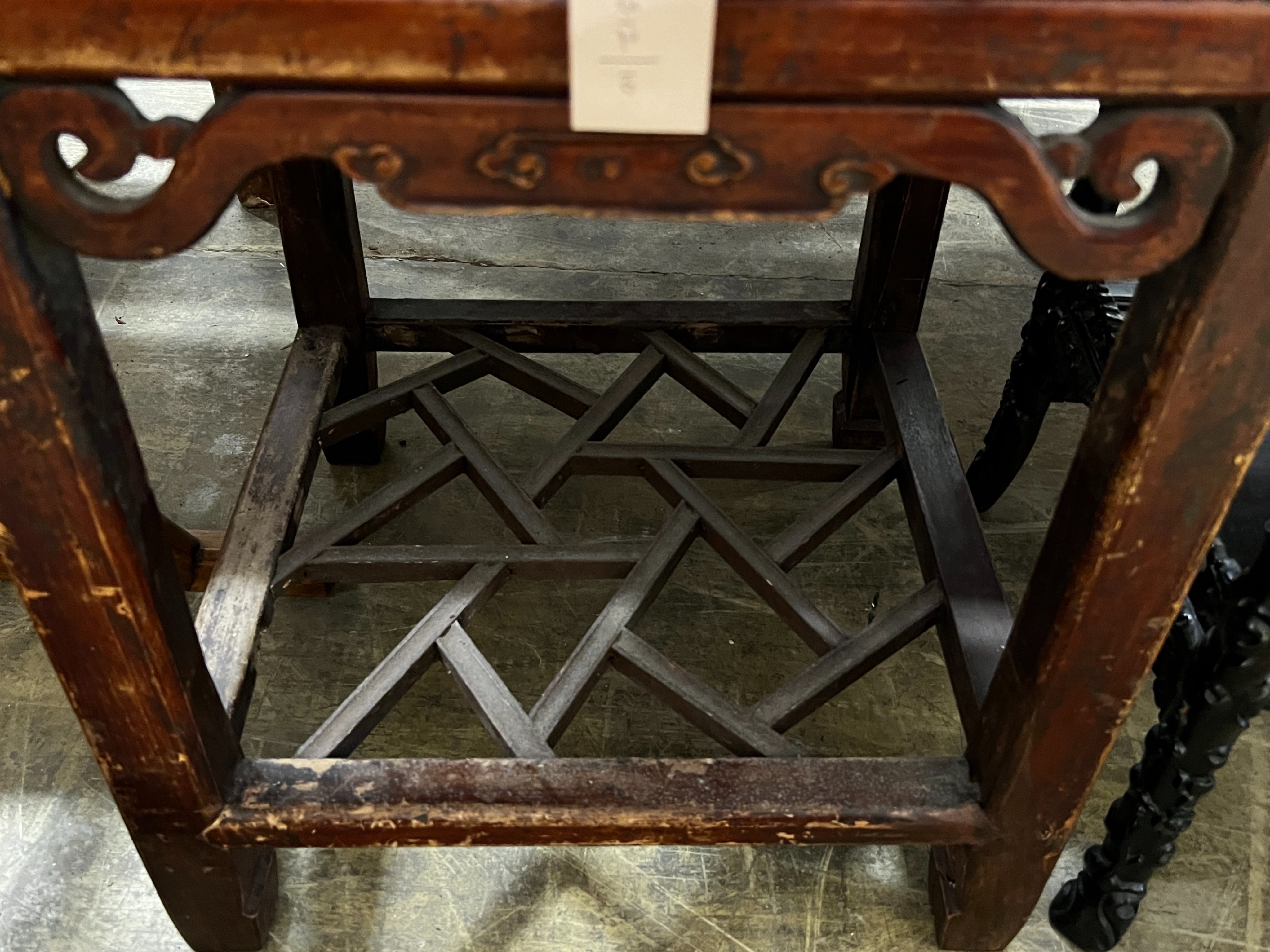 A Chinese lacquered wood three drawer side table, width 43cm, depth 44cm, height 77cm